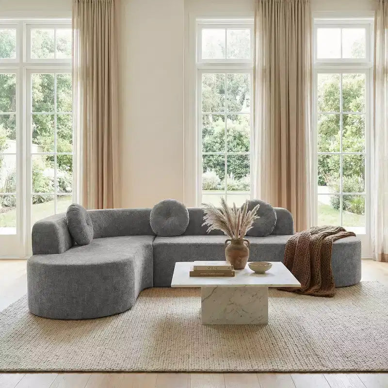 Divano componibile extra large da 310 cm, elegante divano in tessuto con tre cuscini rotondi, schiuma ad alta resilienza